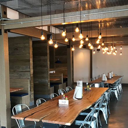 Central BBQ Memphis, TN Table and Booths with custom light fixture 